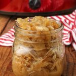 caramelized onions fill this small jar to the brim in this photo