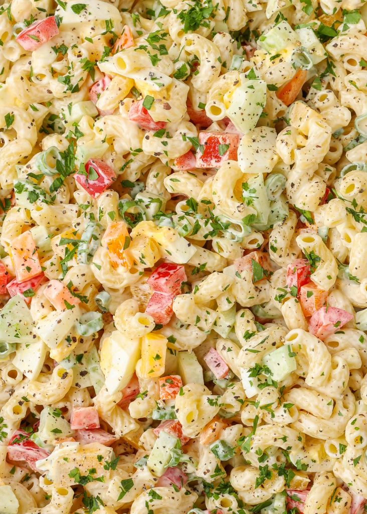 A close up shot of the macaroni salad, ready to eat.