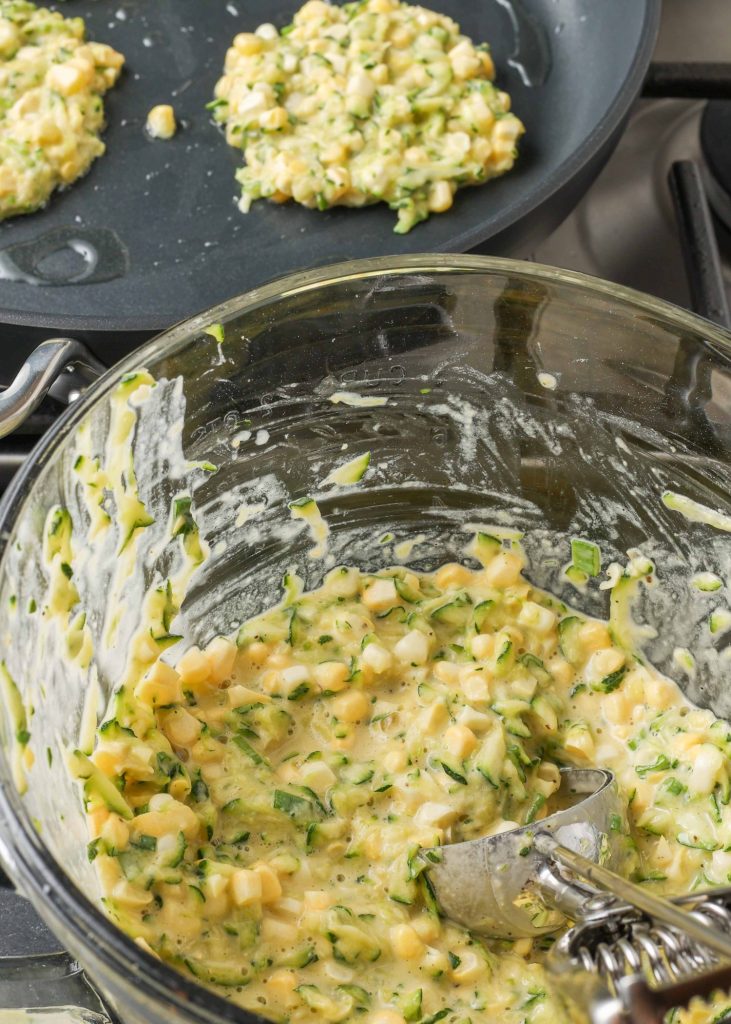 zucchini fritters in pan