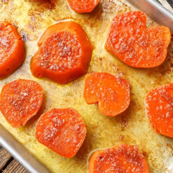 Overhead vertical shot of glazed sweet potatoes in pan