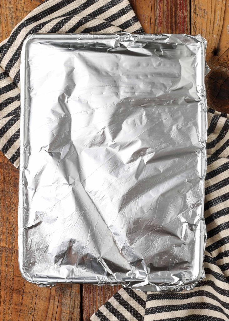 Overhead vertical shot of pan covered with foil