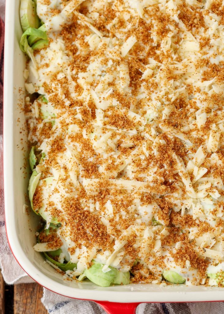 Brussels topped with cream sauce, cheese, and breadcrumbs