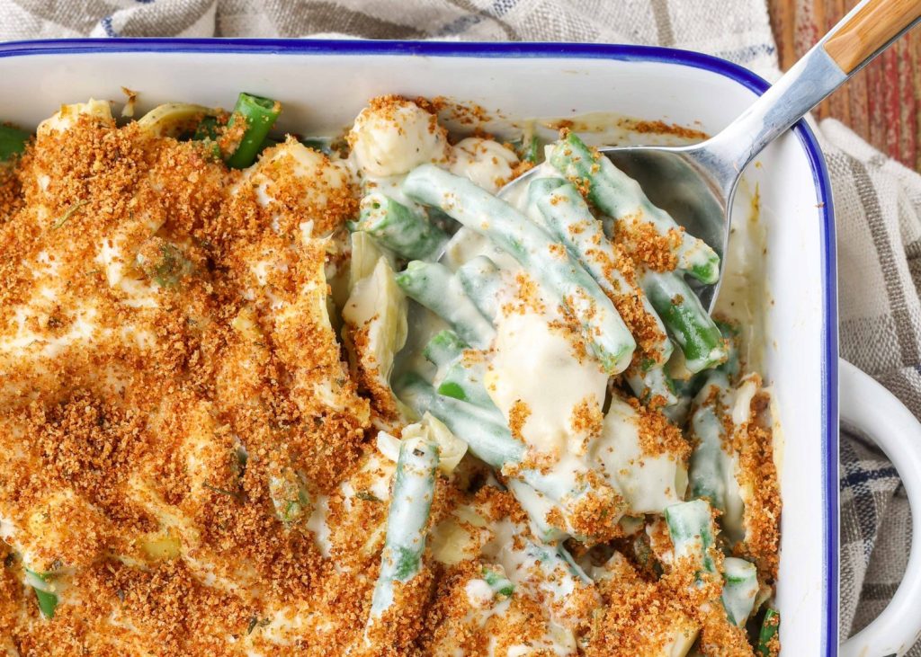green beans and artichokes in a creamy sauce