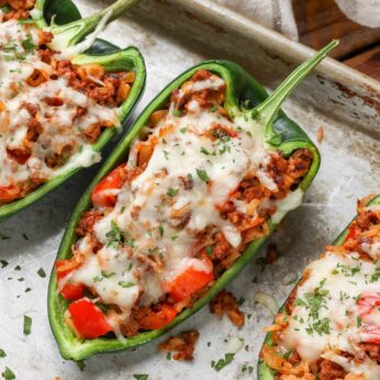cheese topped ground beef stuffed peppers