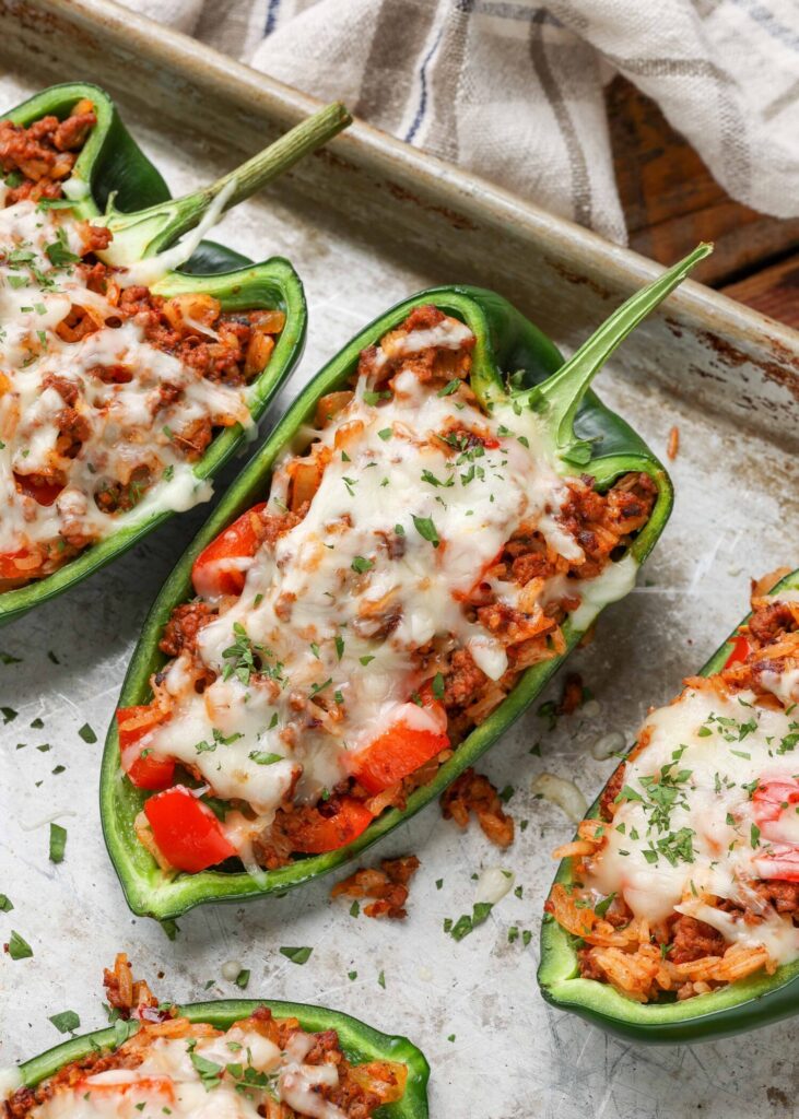 cheese topped ground beef stuffed peppers