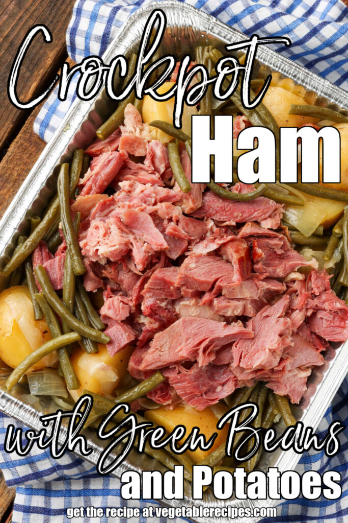 White lettering has been overlaid this image of a serving dish laden with ham, potatoes, and green beans. It reads, "Crockpot Ham Green Beans, and Potatoes".