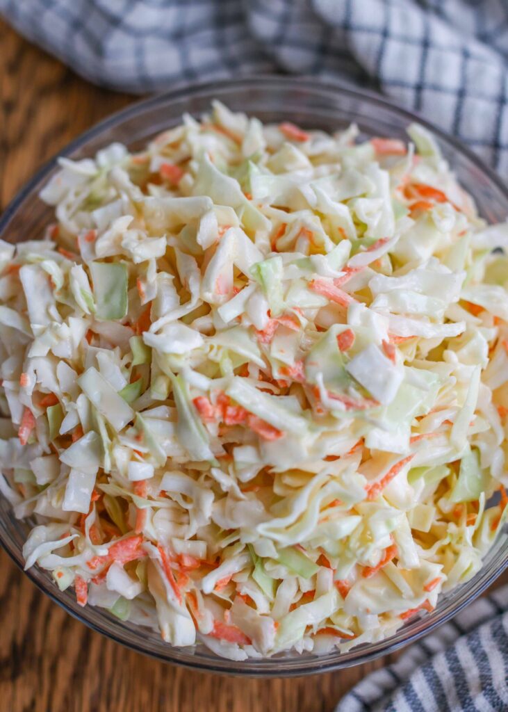a large serving of chick fil a coleslaw on a ceramic plate.