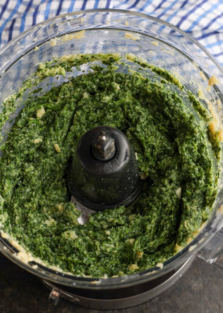 pureed spinach and artichokes in food processor