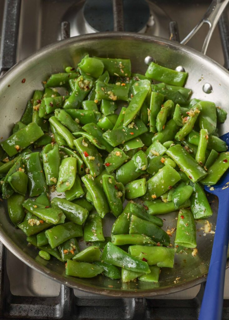 Buttery green beans in skillet