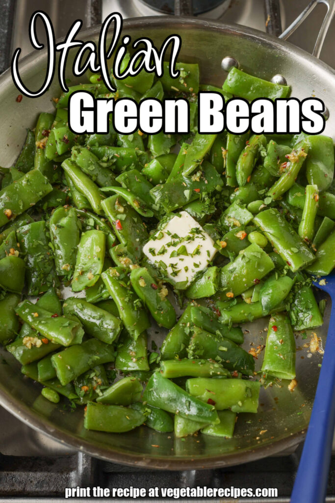 Overhead shot of buttery seasoned green beans in stainless steel skillet