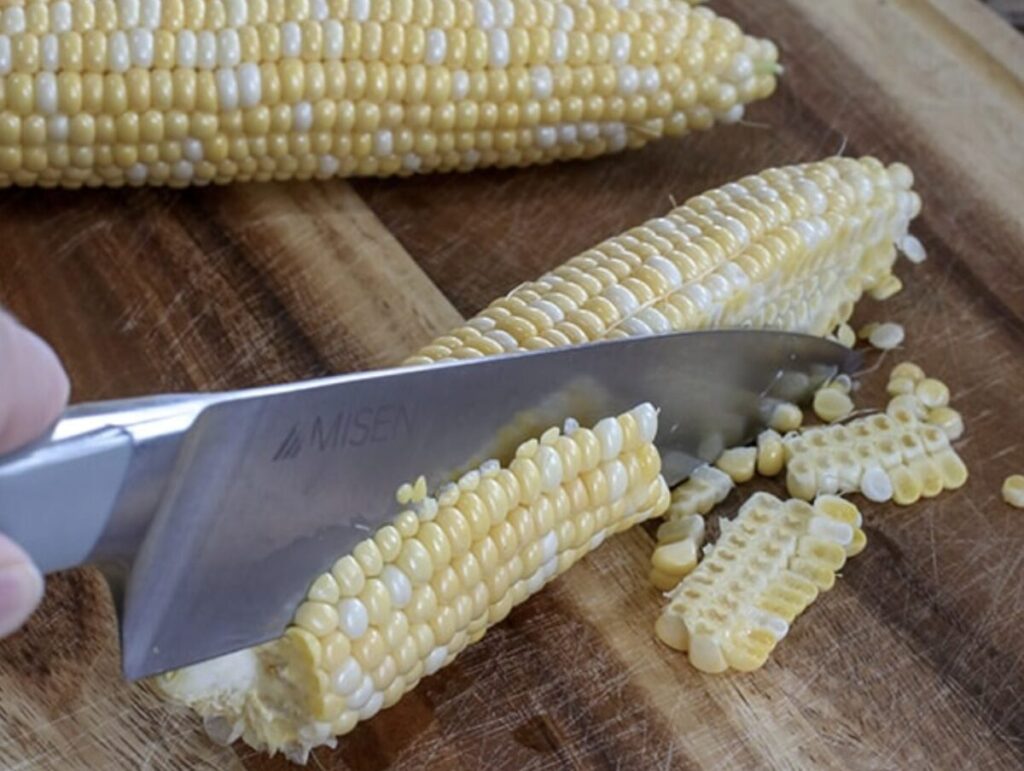 slicing corn on the cob