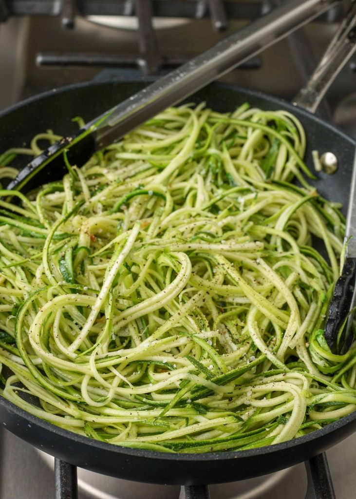 noodles of zucchini in skillet