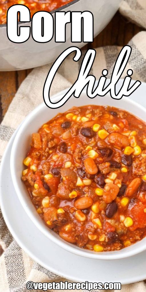 chili with beef, beans, and corn in white pottery bowl