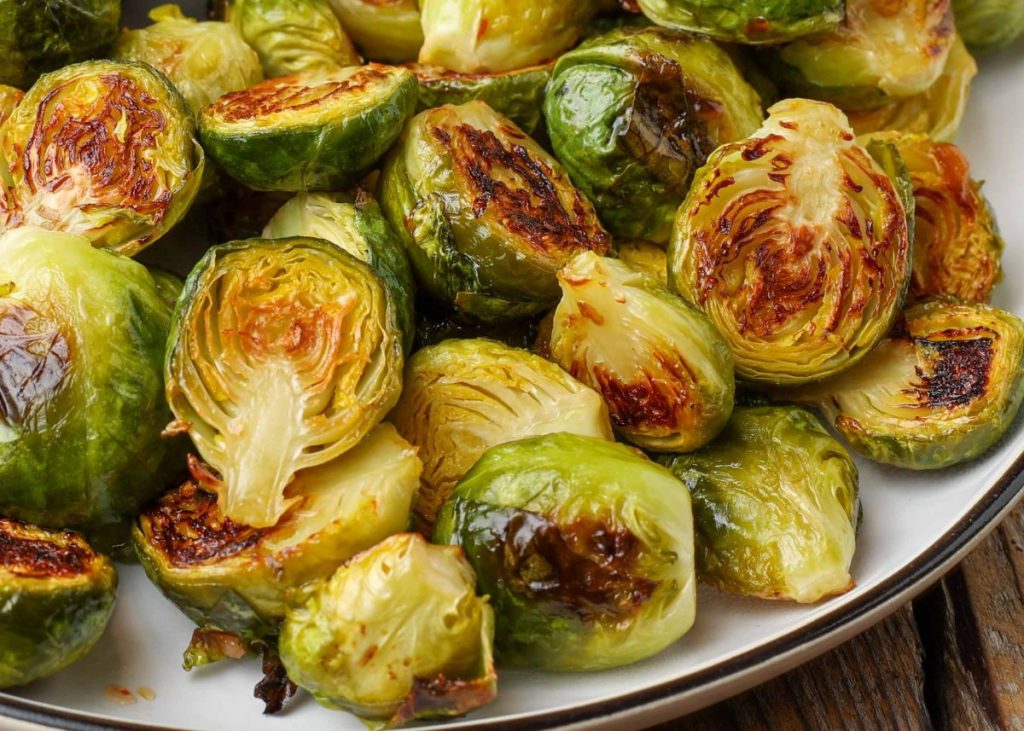 close up photos of Brussels sprouts on plate