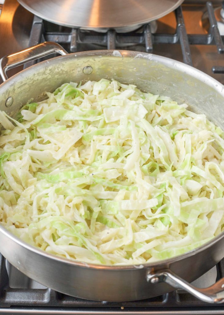 creamed cabbage in large skillet with lid