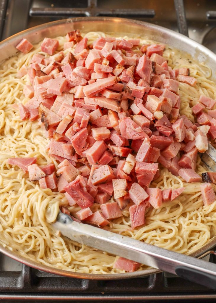 pasta and ham in skillet
