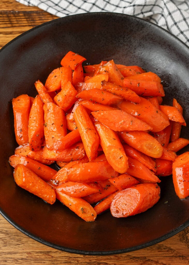 overhead shot of carrots in black bowl