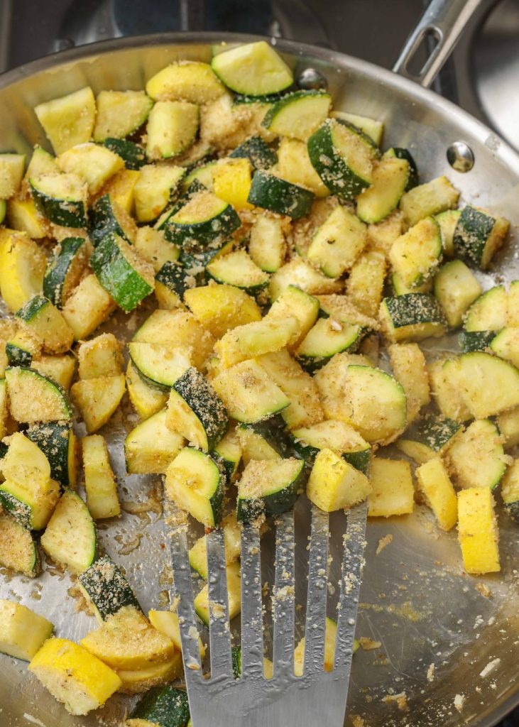 breadcrumb tossed zucchini in large skillet