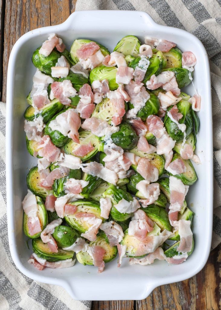 Brussels sprouts in baking dish with bacon