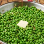 peas in skillet with butter
