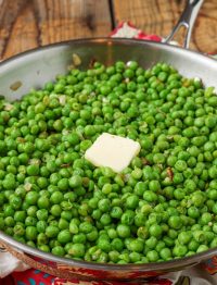 peas in skillet with butter