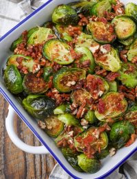 Brussels sprouts in white dish with blue edges