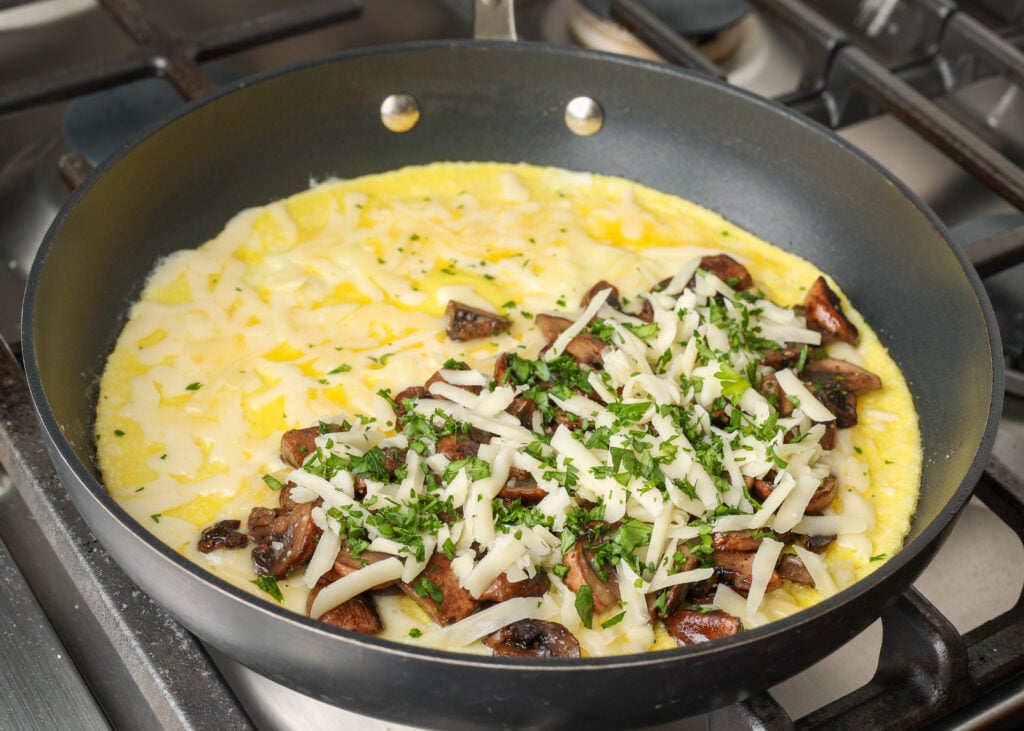 filled omelet about to be closed